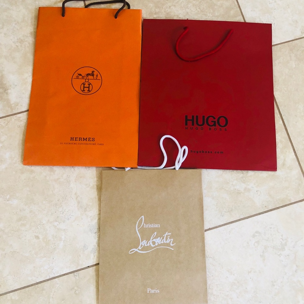 Louboutin Hugo Boss Hermès shopping bags